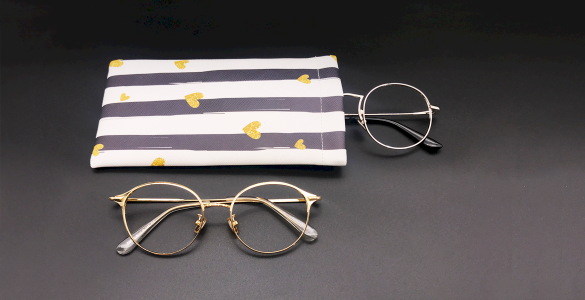 Gold frame glasses
					